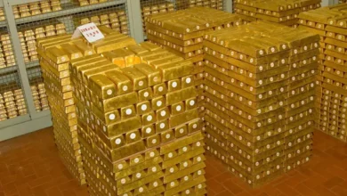 Imagen de lingotes de oro en una bóveda