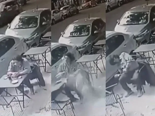 Imagen de un vidrio roto en la vereda