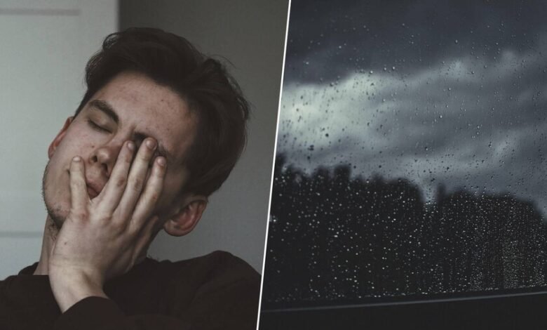 Imagen de una persona bajo la lluvia, con un cielo nublado