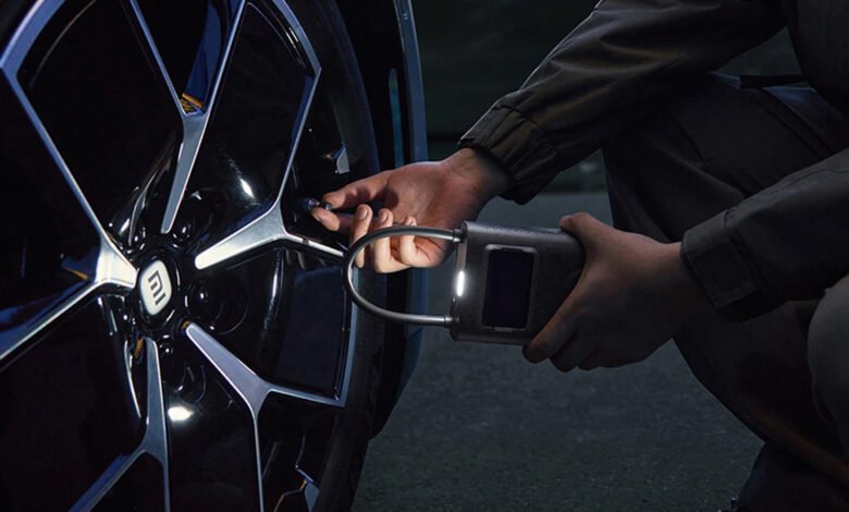 Imagen del Compresor Portátil de Xiaomi en acción