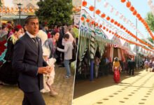Imagen de la Feria de Sevilla con personas disfrutando del evento