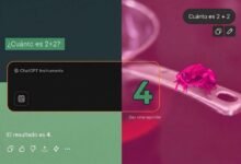 Una persona pensativa con una computadora en el fondo