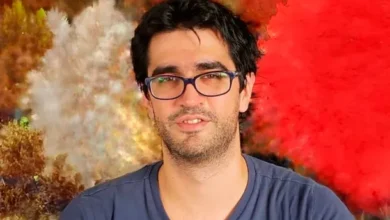 Imagen de un médico con un estetoscopio, con un fondo de una sala de hospital