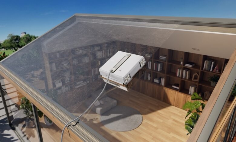 Imagen del robot limpiacristales Pano 10 Station en acción, limpiando una ventana.