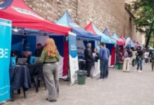 Cartel informativo de La Muni con Vos en barrios de Córdoba